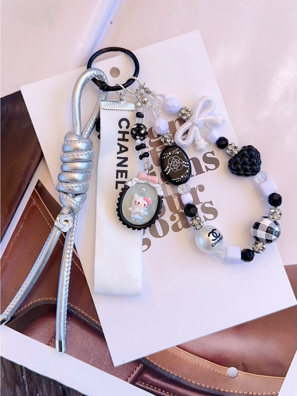 Authentic CC Ribbon with unbranded White & Black Beaded Bag Charm - Picture 1 of 4